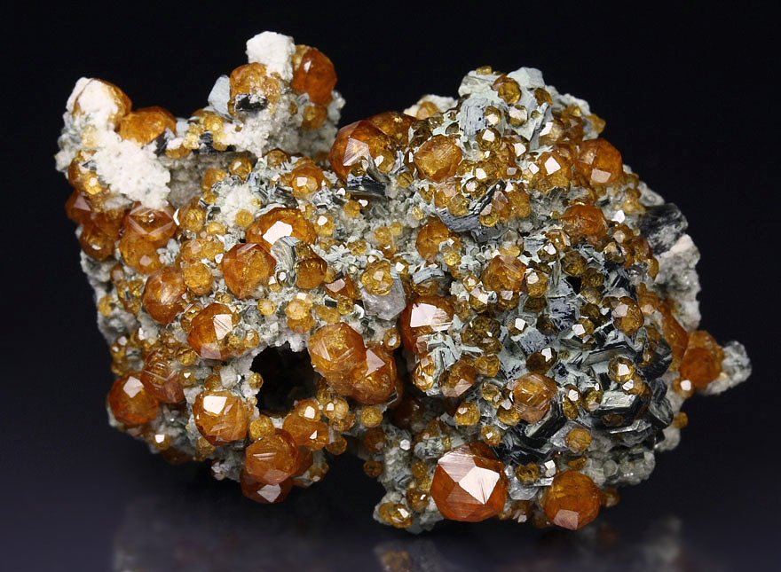 GARNET var. SPESSARTINE, QUARTZ var. SMOKY, MUSCOVITE, MICROCLINE