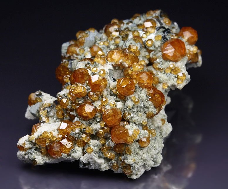 GARNET var. SPESSARTINE, QUARTZ var. SMOKY, MUSCOVITE, MICROCLINE