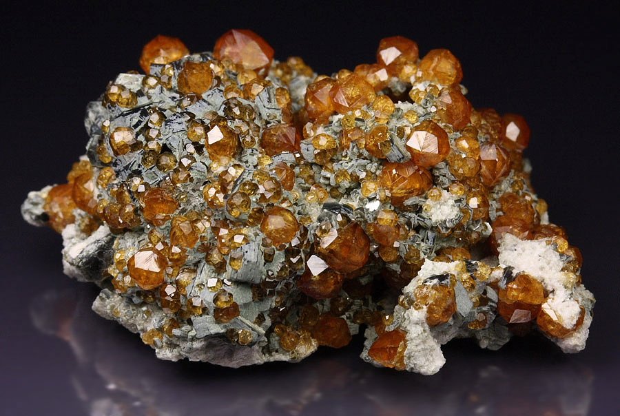 GARNET var. SPESSARTINE, QUARTZ var. SMOKY, MUSCOVITE, MICROCLINE