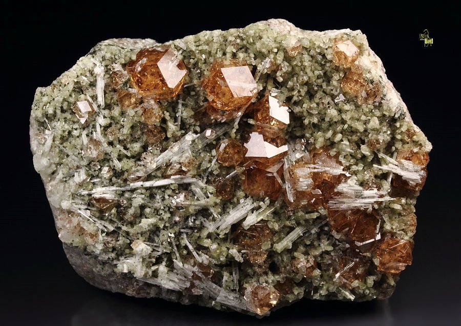 gem GARNET var. GROSSULAR with PECTOLITE inclusions, DIOPSIDE 