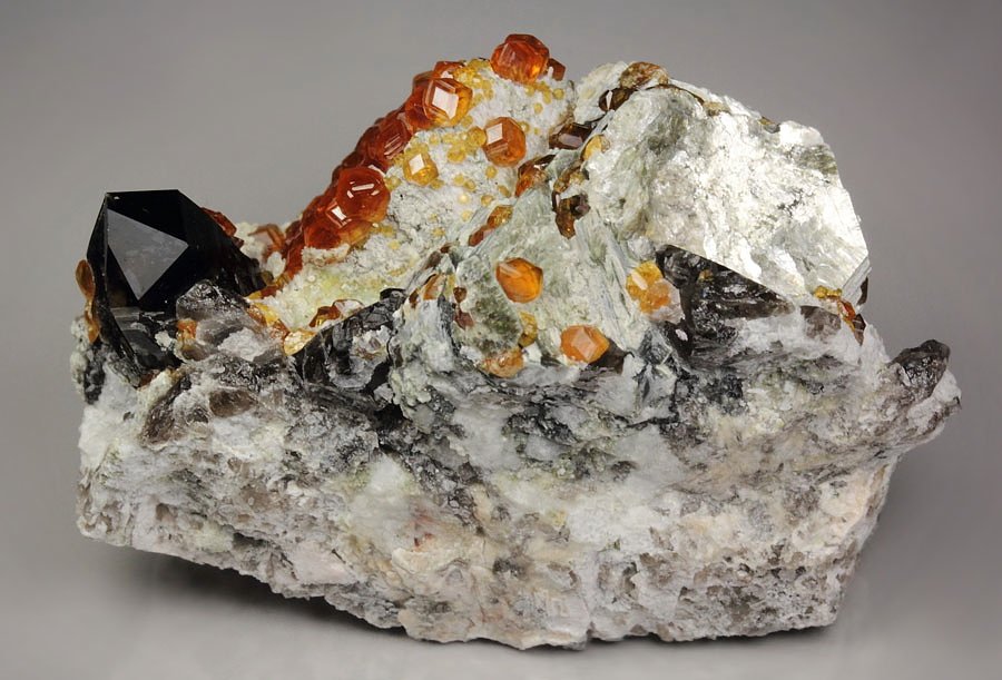 gem GARNET var. SPESSARTINE, QUARTZ var. SMOKY, MUSCOVITE, MICROCLINE, FLUORITE