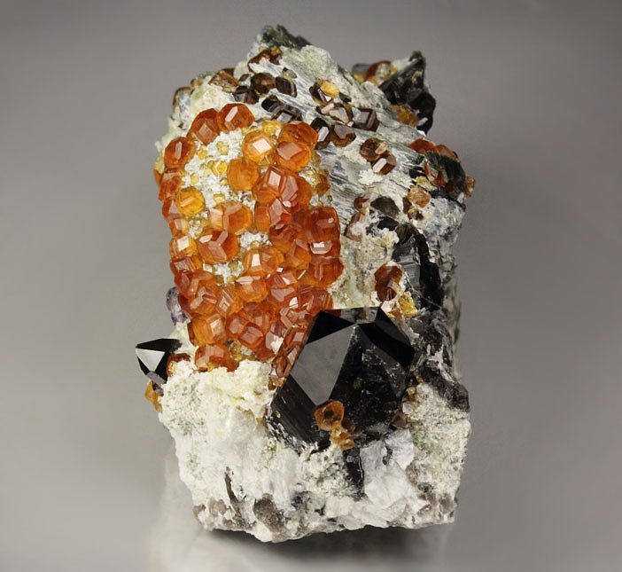 gem GARNET var. SPESSARTINE, QUARTZ var. SMOKY, MUSCOVITE, MICROCLINE, FLUORITE