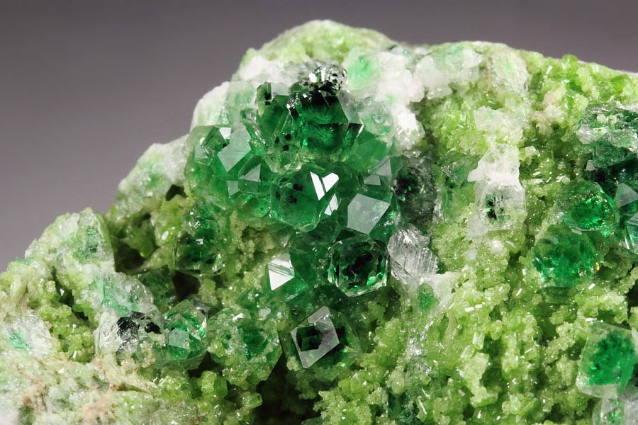 gem GARNET var. GROSSULAR with GREEN CHROMIAN PHANTOMS, DIOPSIDE, CHROMITE