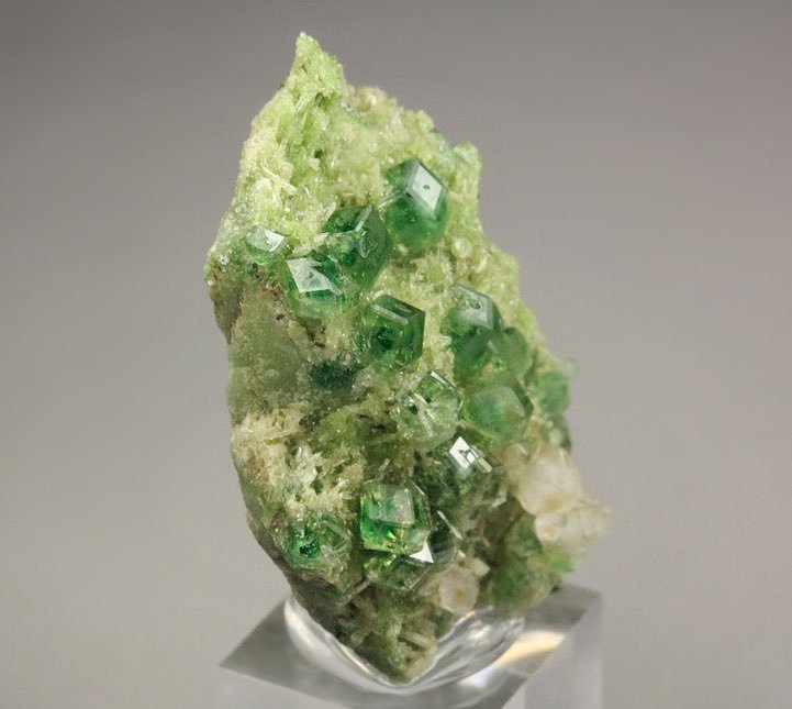 gem GARNET var. GROSSULAR with GREEN CHROMIAN PHANTOMS, DIOPSIDE, APOPHYLLITE