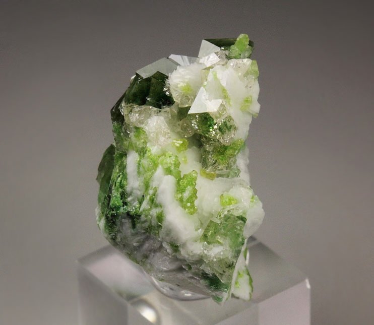 gem GARNET var. GROSSULAR with GREEN CHROMIAN PHANTOMS, DIOPSIDE, ALBITE