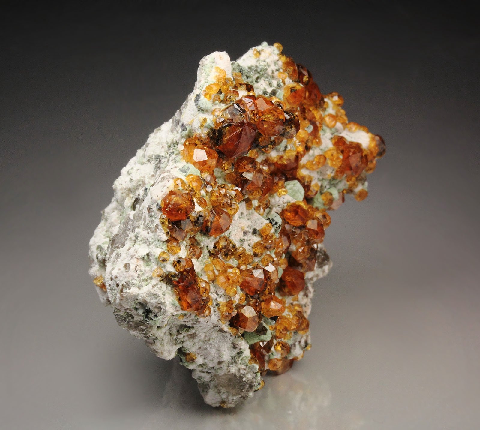 gem GARNET var. SPESSARTINE, MICROCLINE, MUSCOVITE