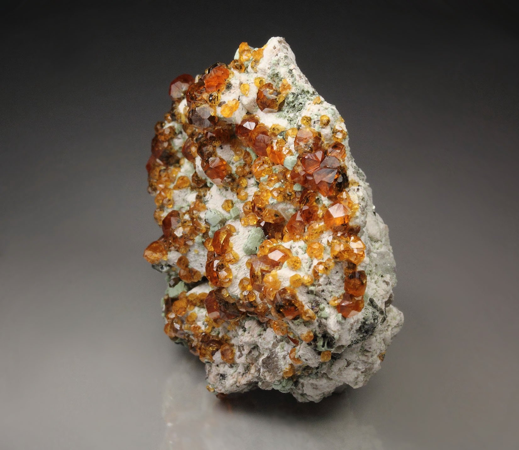 gem GARNET var. SPESSARTINE, MICROCLINE, MUSCOVITE