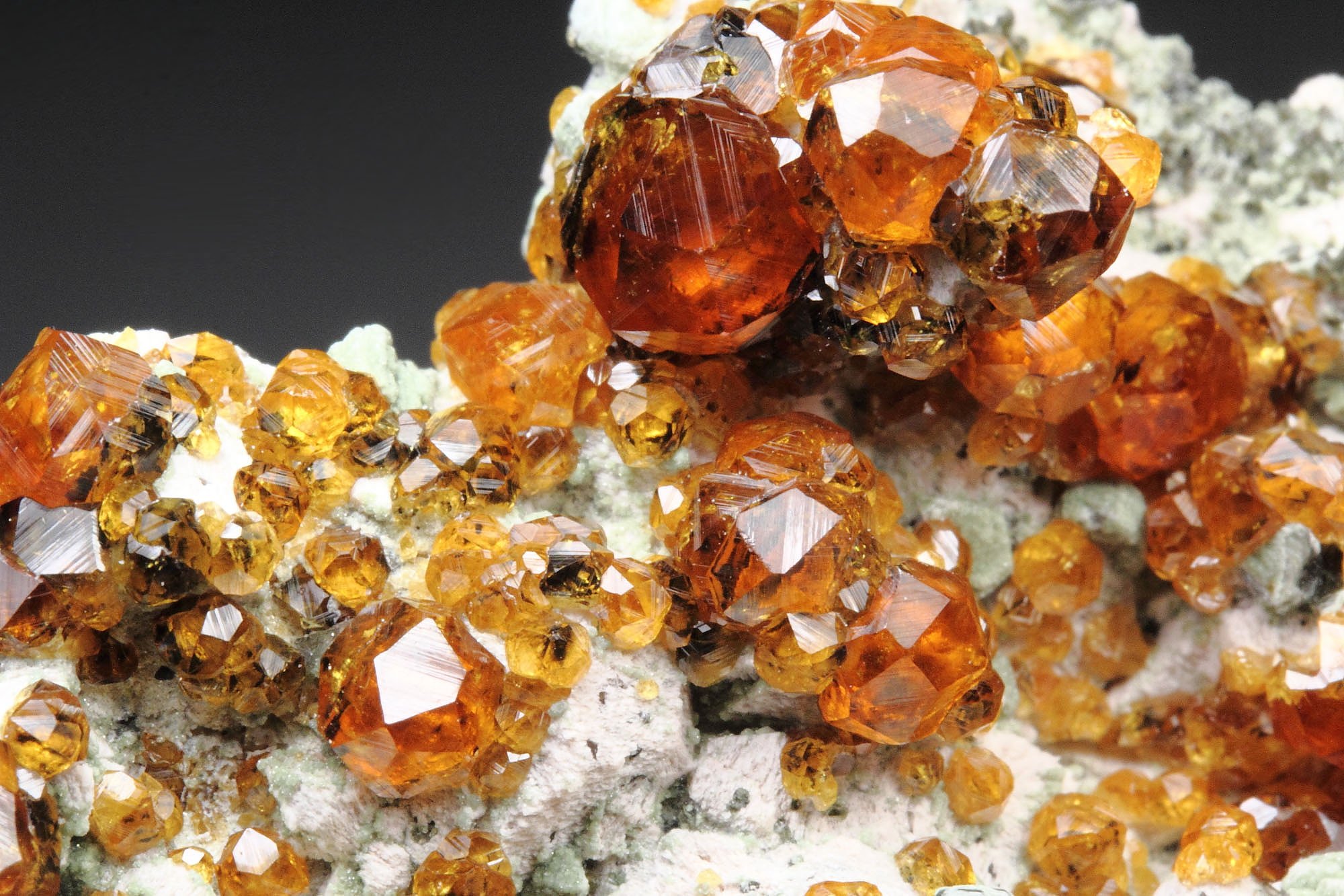 gem GARNET var. SPESSARTINE, MICROCLINE, MUSCOVITE