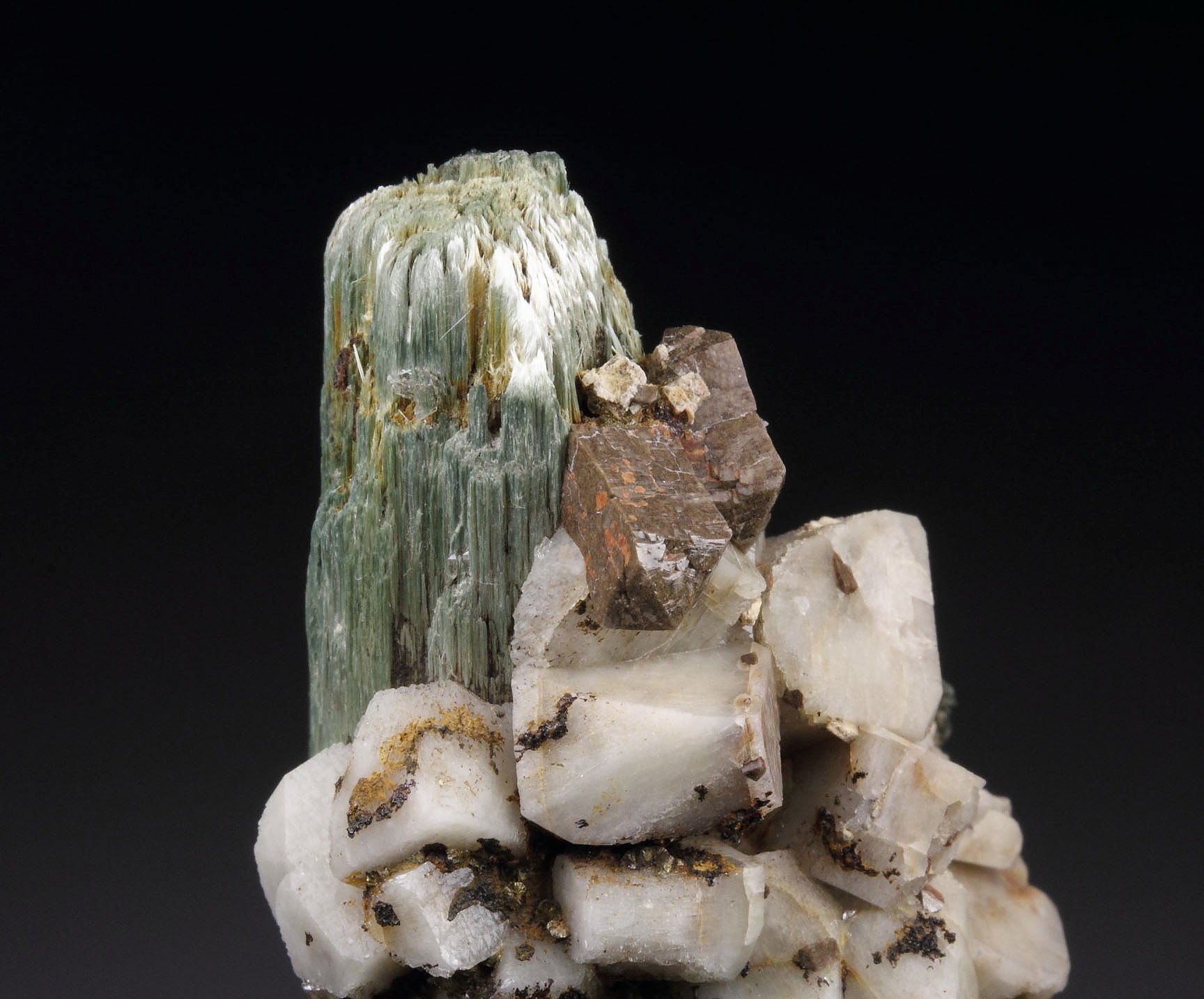 RIEBECKITE pseudomorph after ARFVEDSONITE, ZIRCON, MICROCLINE, QUARTZ 