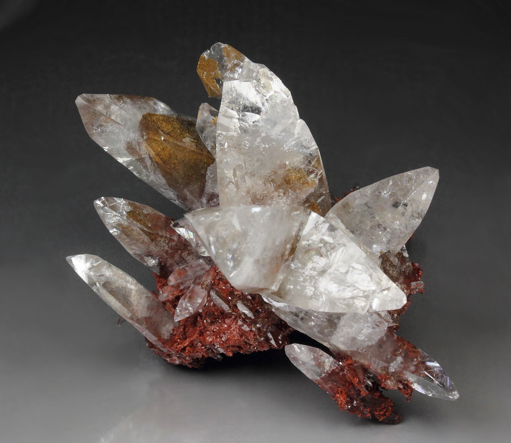 twinned CALCITE with HEMATITE inclusions