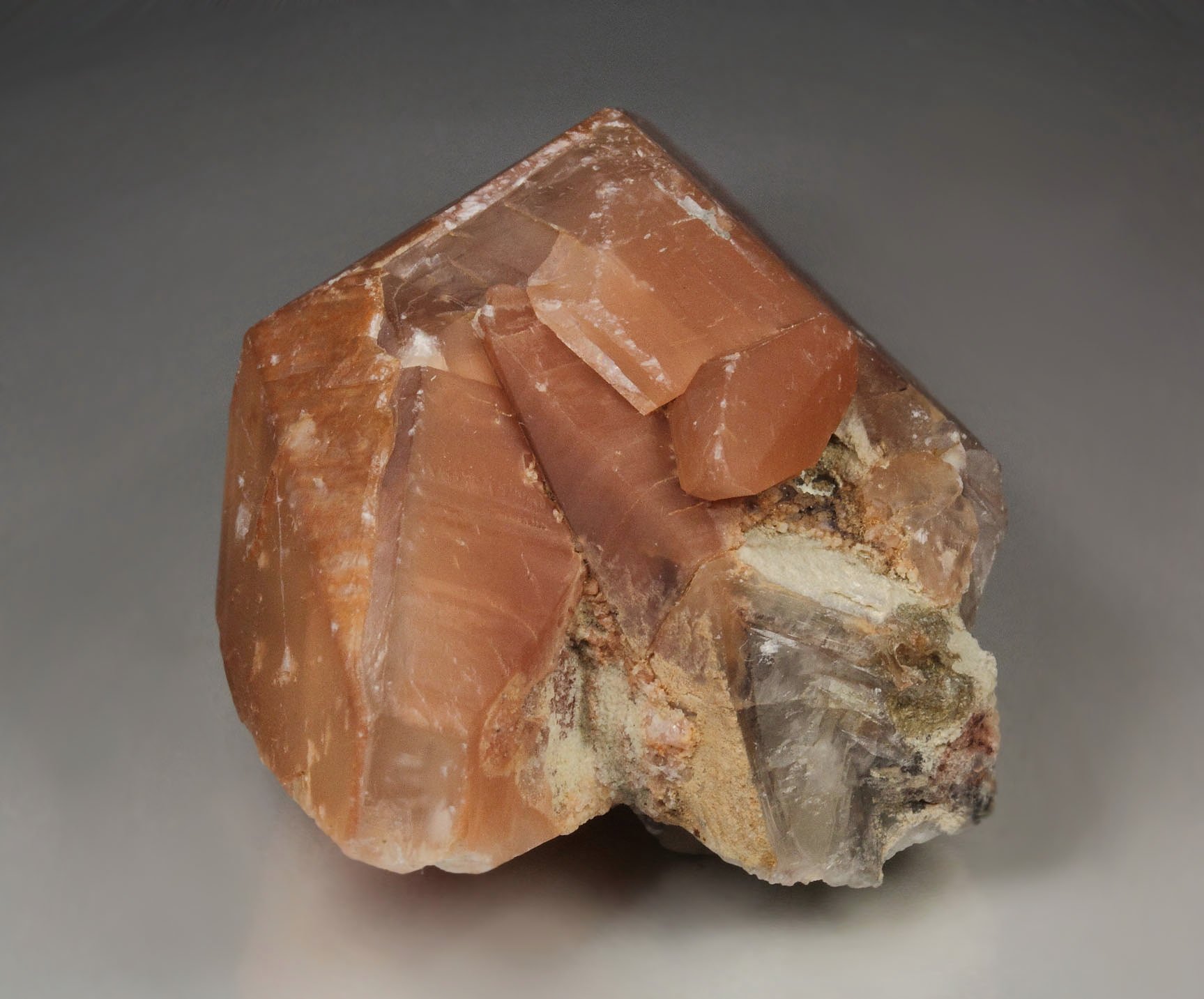 twinned CALCITE with HEMATITE inclusions