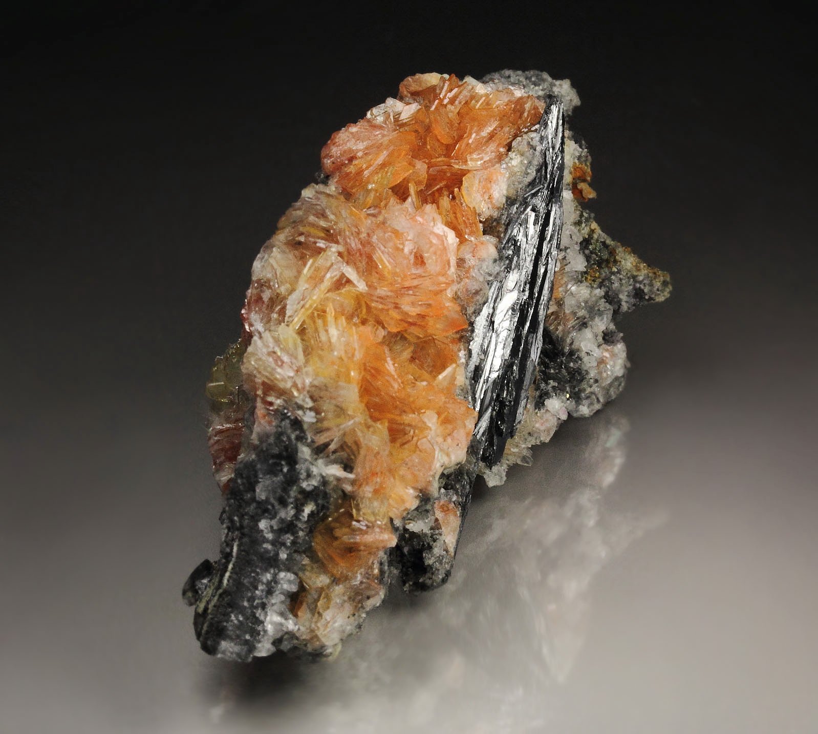 BARYTE with REALGAR inclusions, STIBNITE