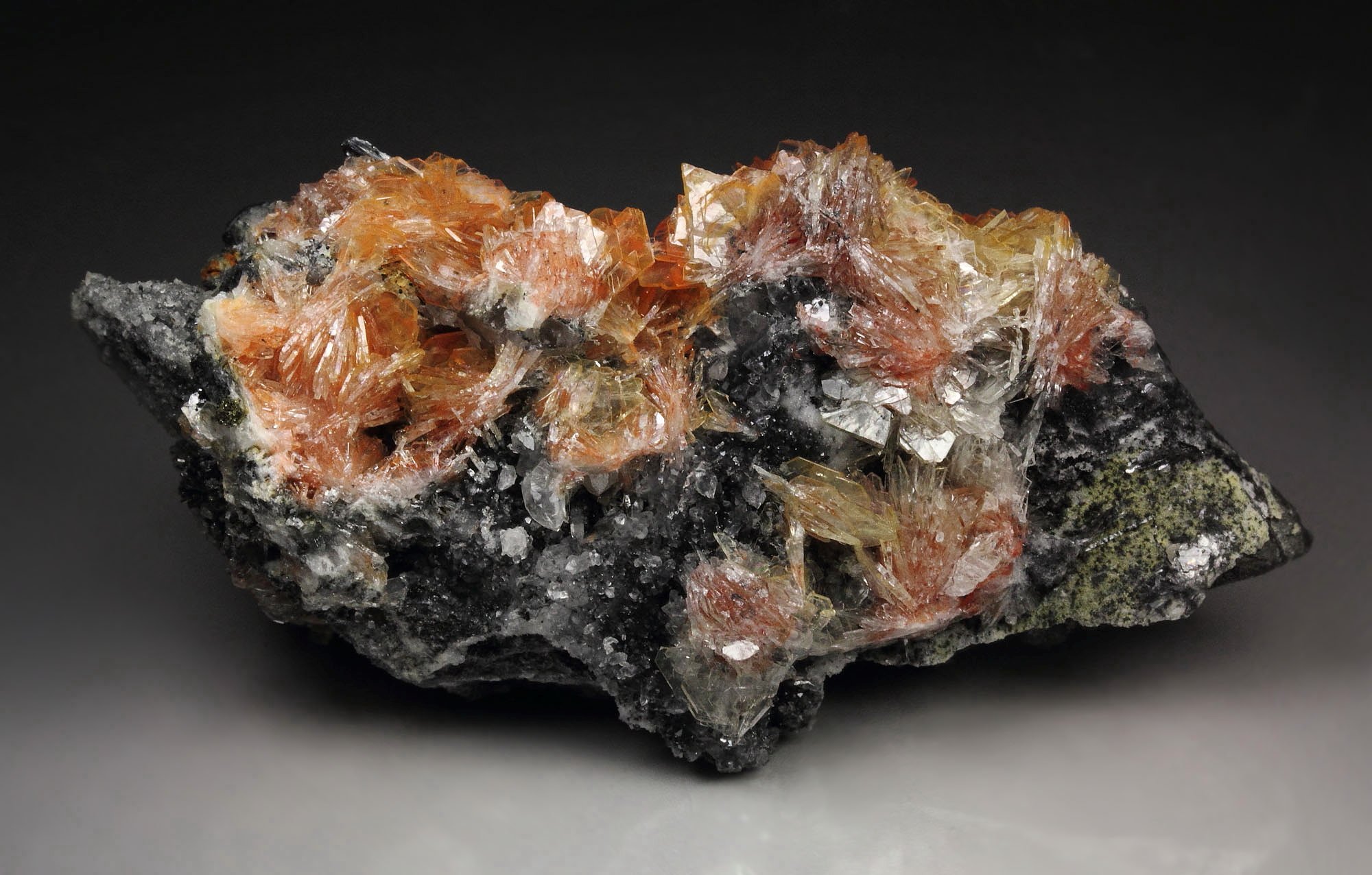 BARYTE with REALGAR inclusions, STIBNITE