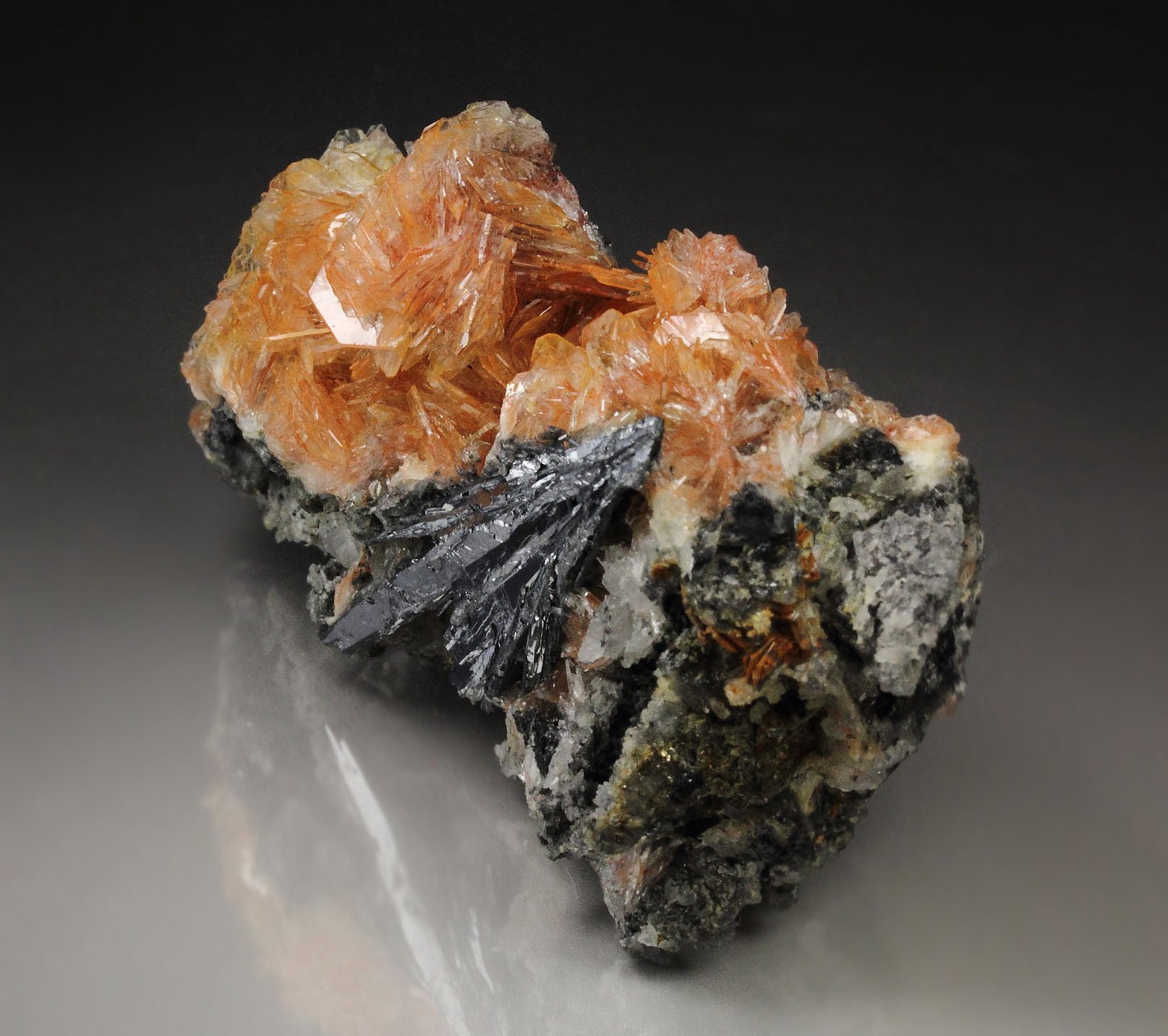 BARYTE with REALGAR inclusions, STIBNITE