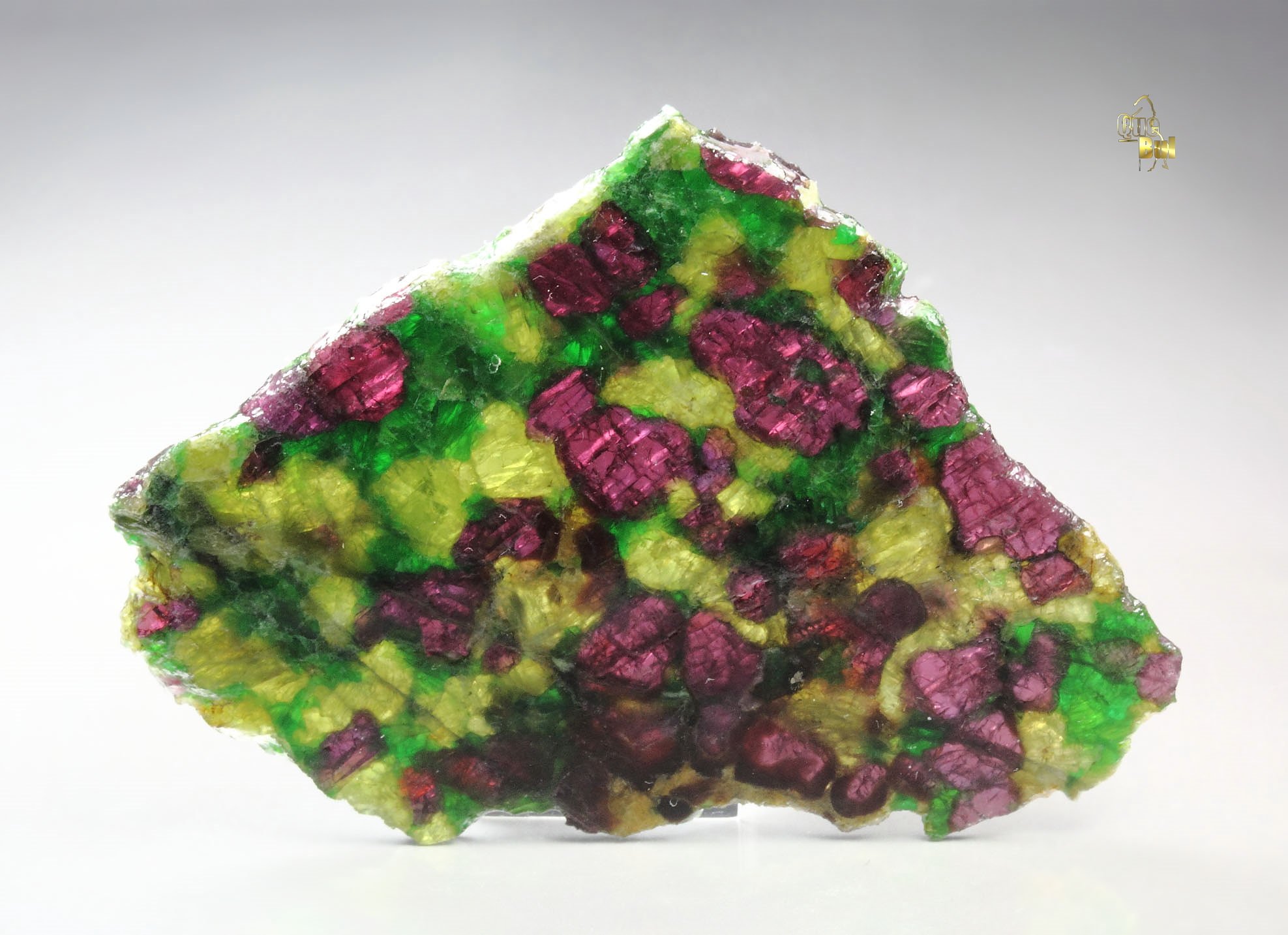 GARNET var. PYROPE, DIOPSIDE var. CHROMIUM-BEARING DIOPSIDE, ENSTATITE