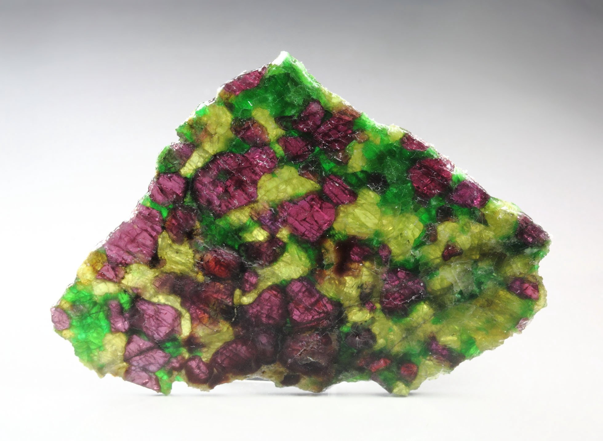 GARNET var. PYROPE, DIOPSIDE var. CHROMIUM-BEARING DIOPSIDE, ENSTATITE