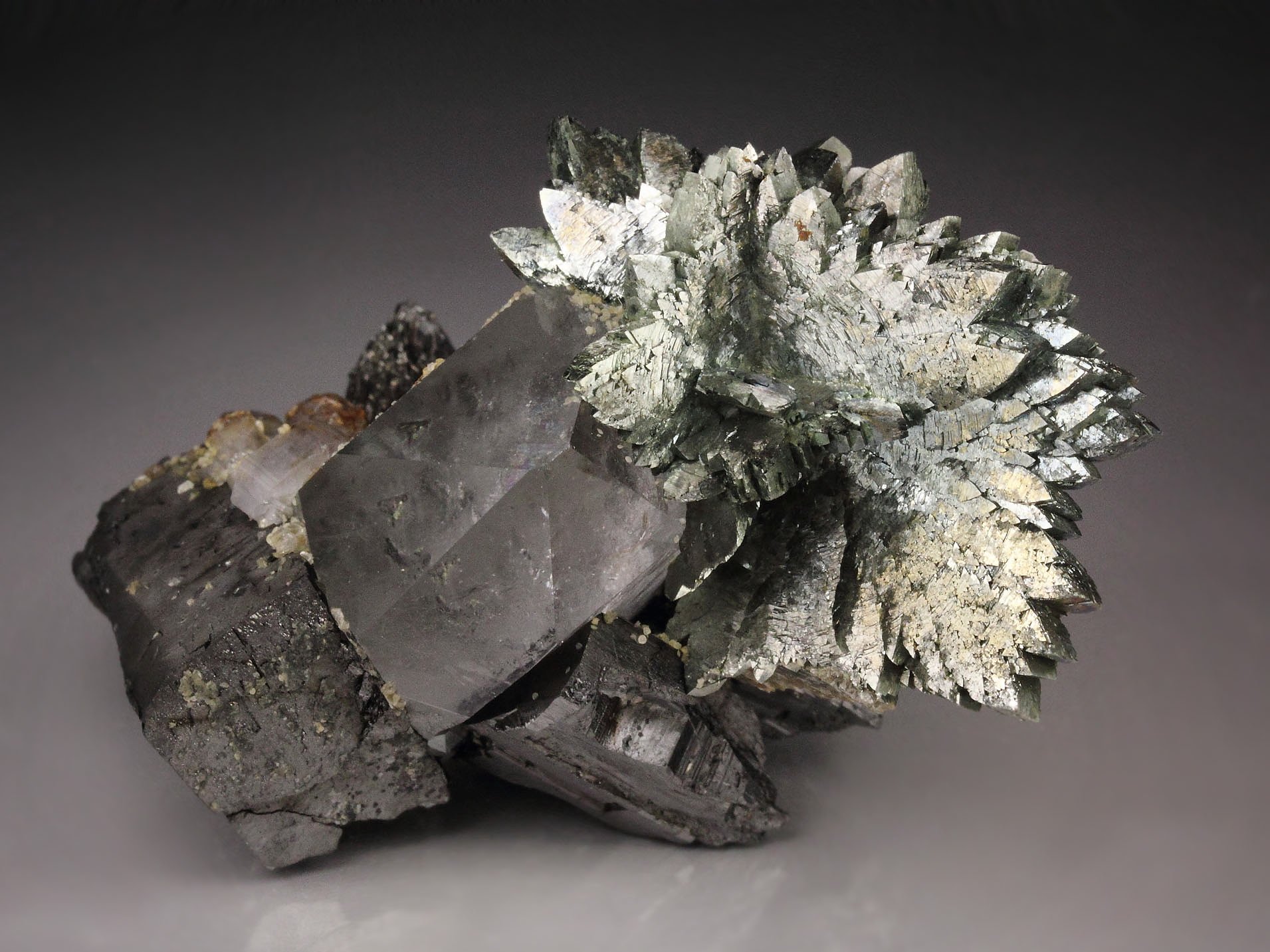 ARSENOPYRITE, FERBERITE, QUARTZ, FLUORAPATITE, SIDERITE