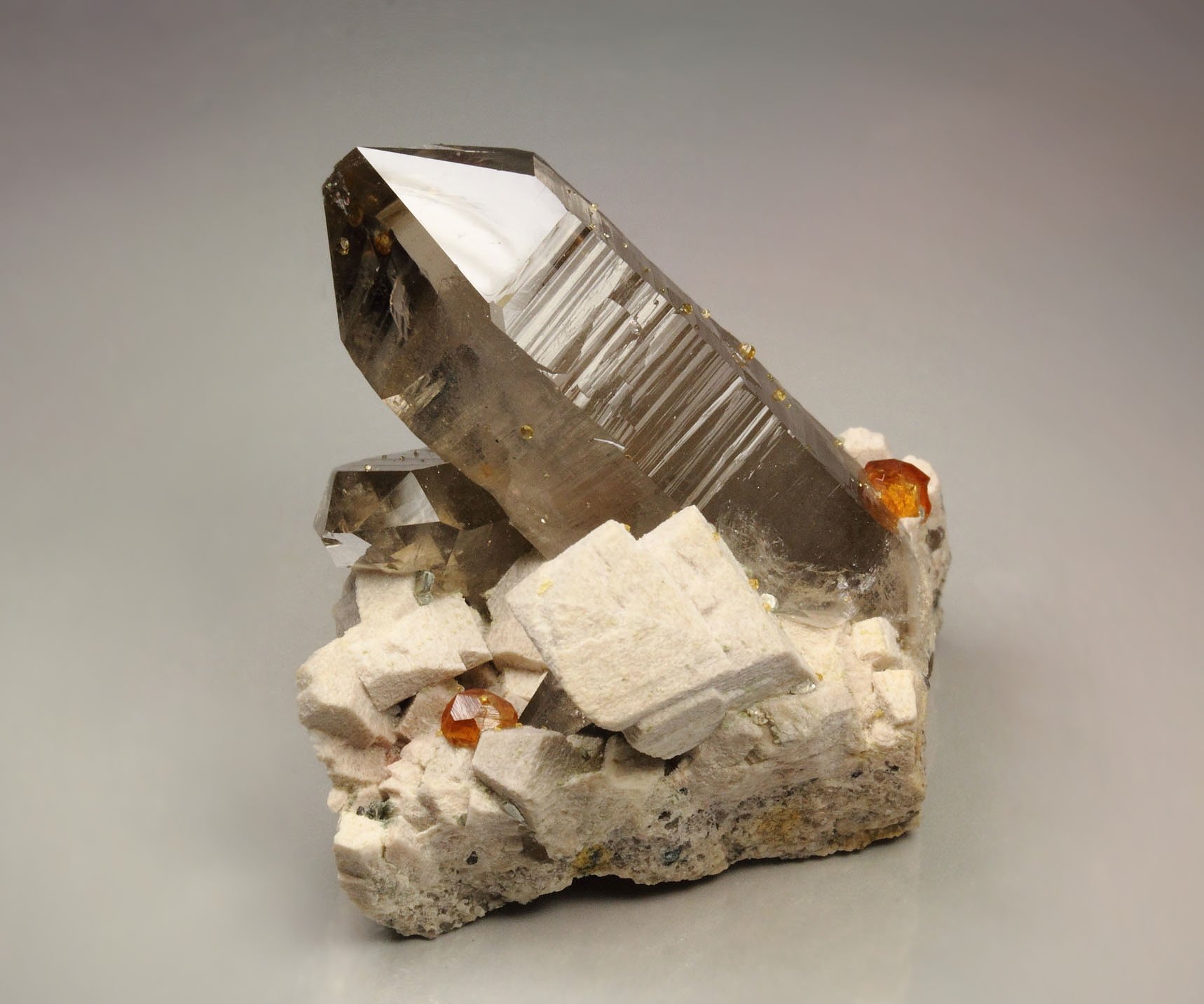 QUARTZ var. SMOKY, gem GARNET var. SPESSARTINE, MICROCLINE