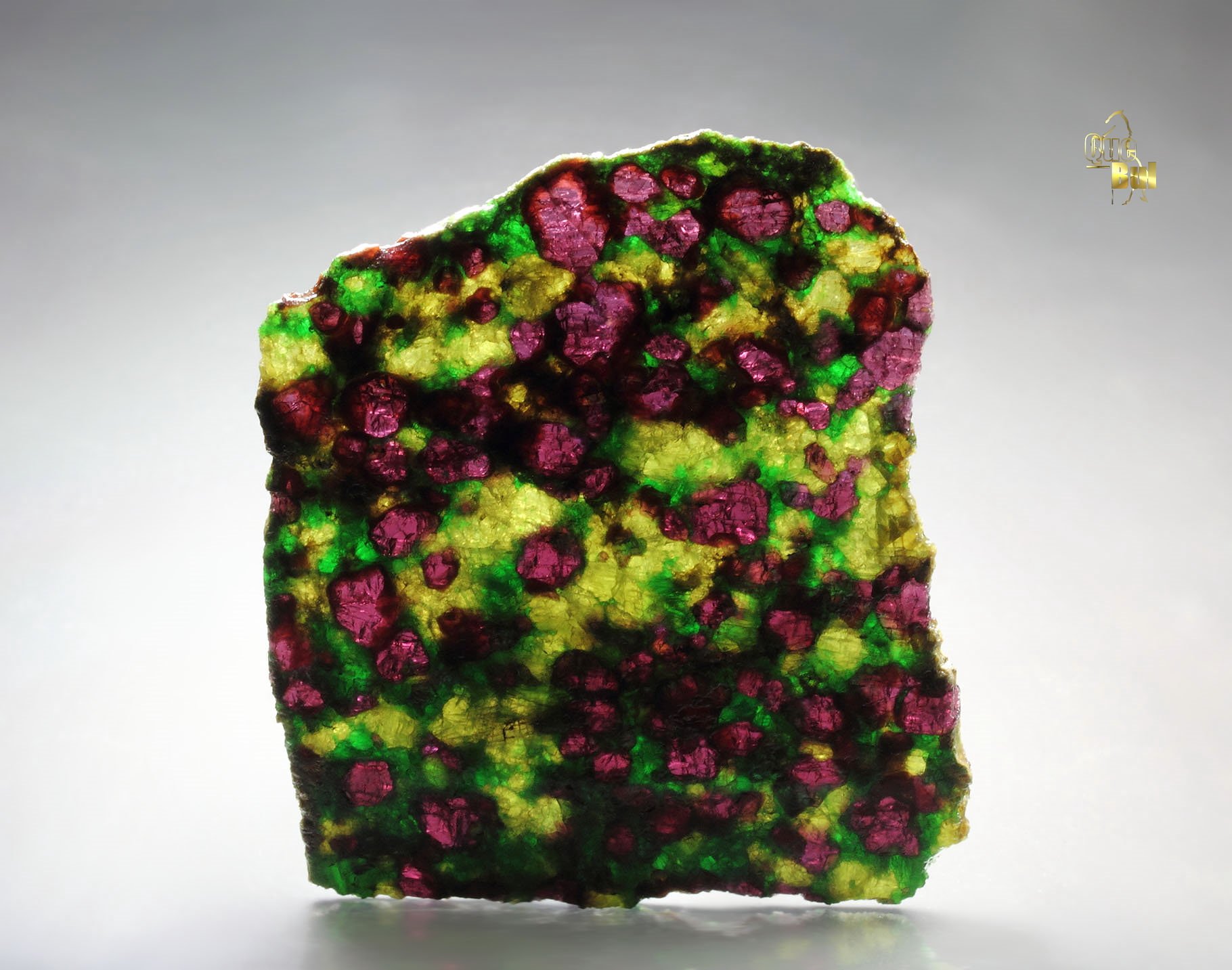 GARNET var. PYROPE, DIOPSIDE var. CHROMIUM-BEARING DIOPSIDE, ENSTATITE