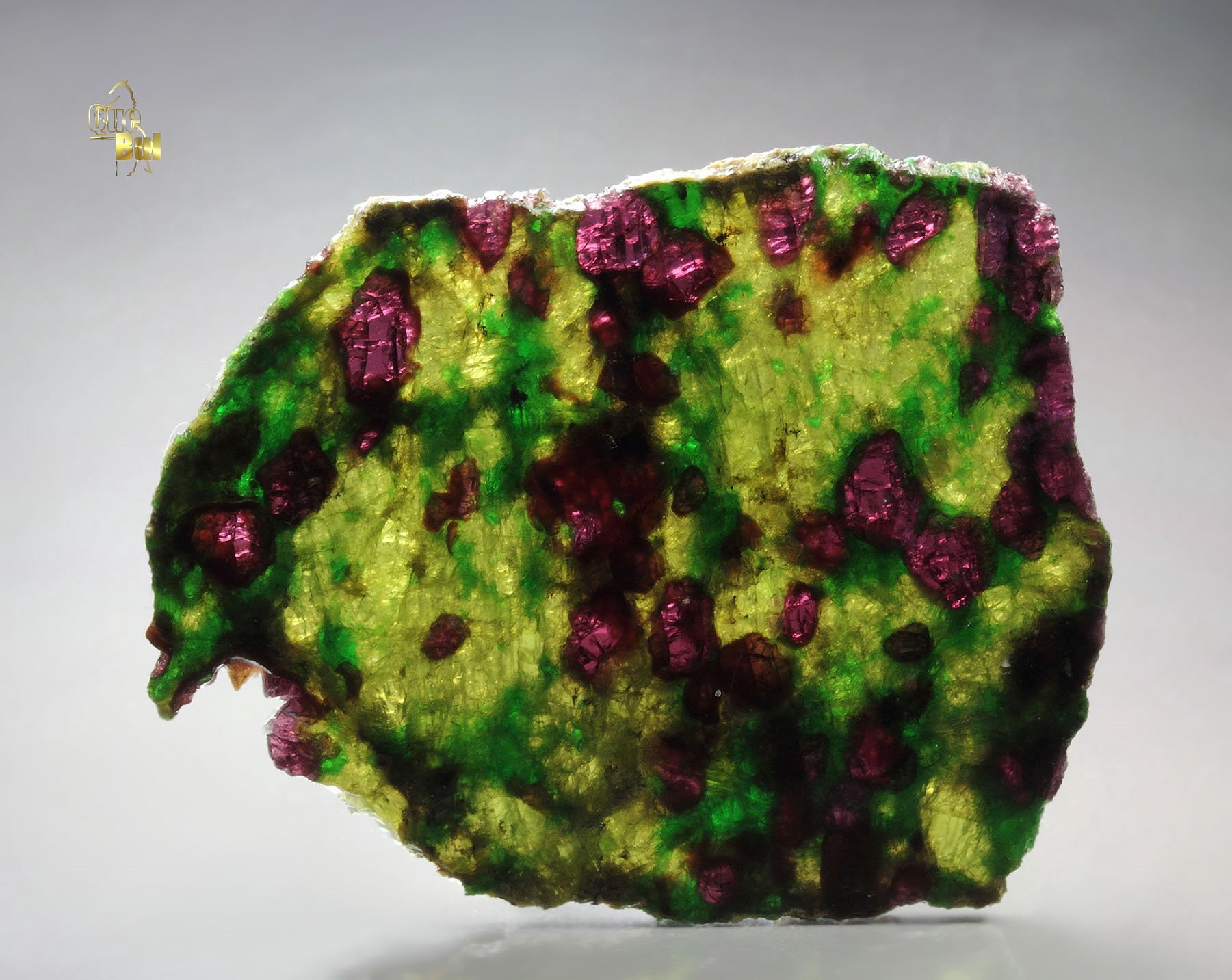 GARNET var. PYROPE, DIOPSIDE var. CHROMIUM-BEARING DIOPSIDE, ENSTATITE